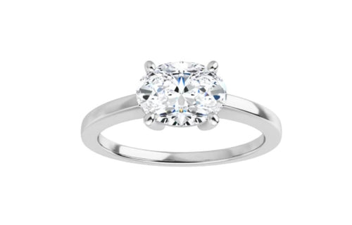 Moissanite oval 8x6mm in 10kt white gold.