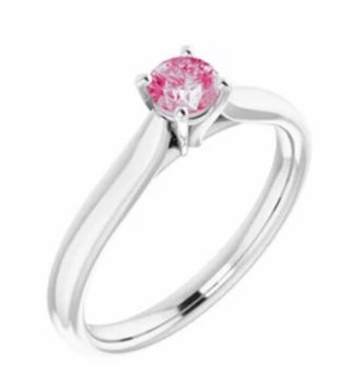 Pink diamond set in white gold solitaire ring.