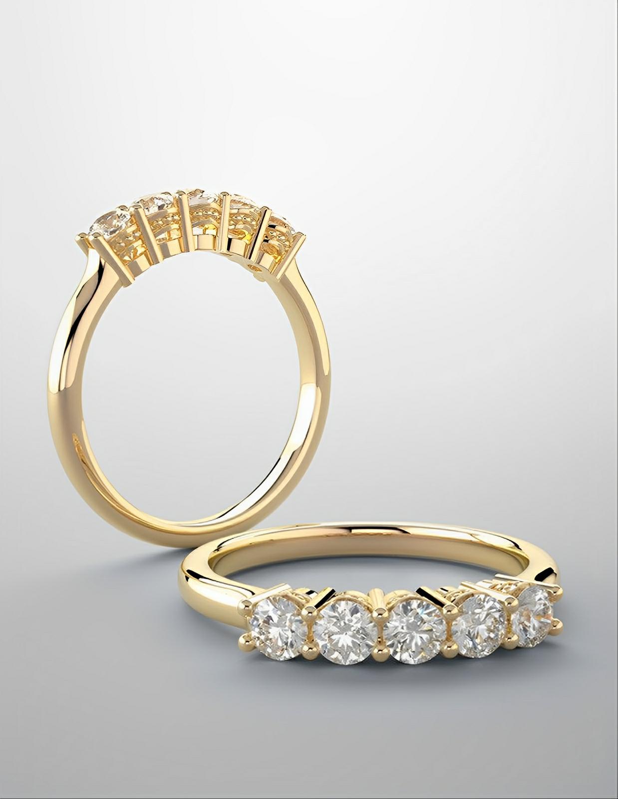 3/8ctw diamond band with yellow gold and diamonds.