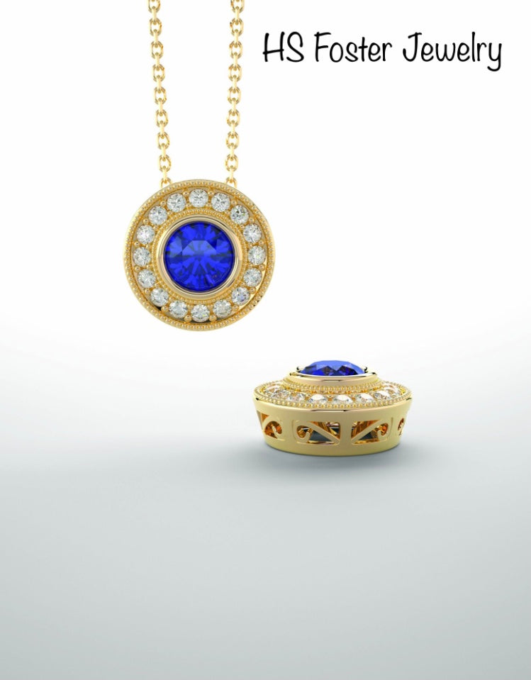 14kt yellow gold Natural blue sapphire and diamond pendant.