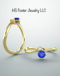 14kt yellow gold Natural sapphire and diamond ring.