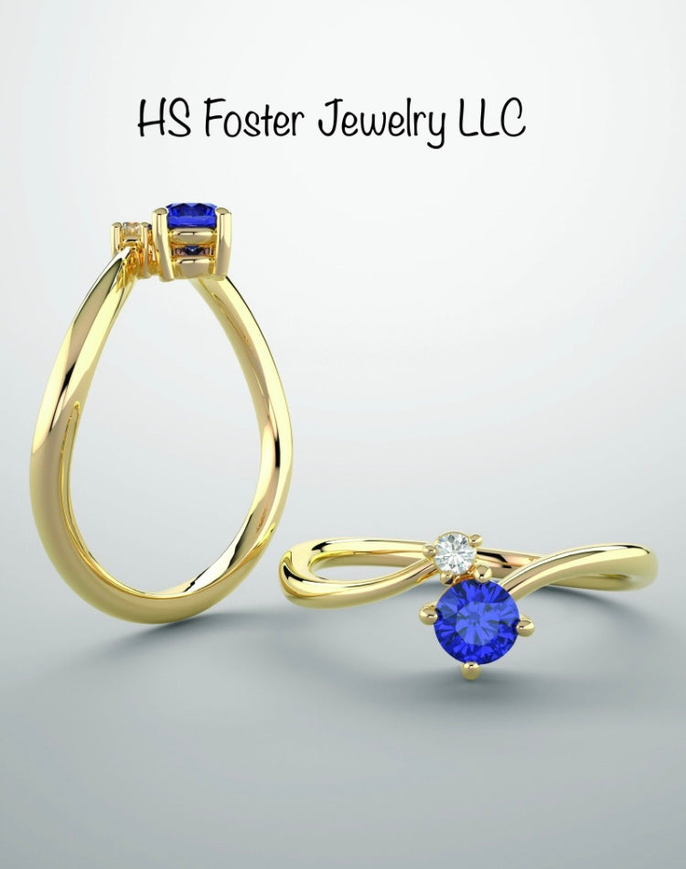 14kt yellow gold Natural sapphire and diamond ring.