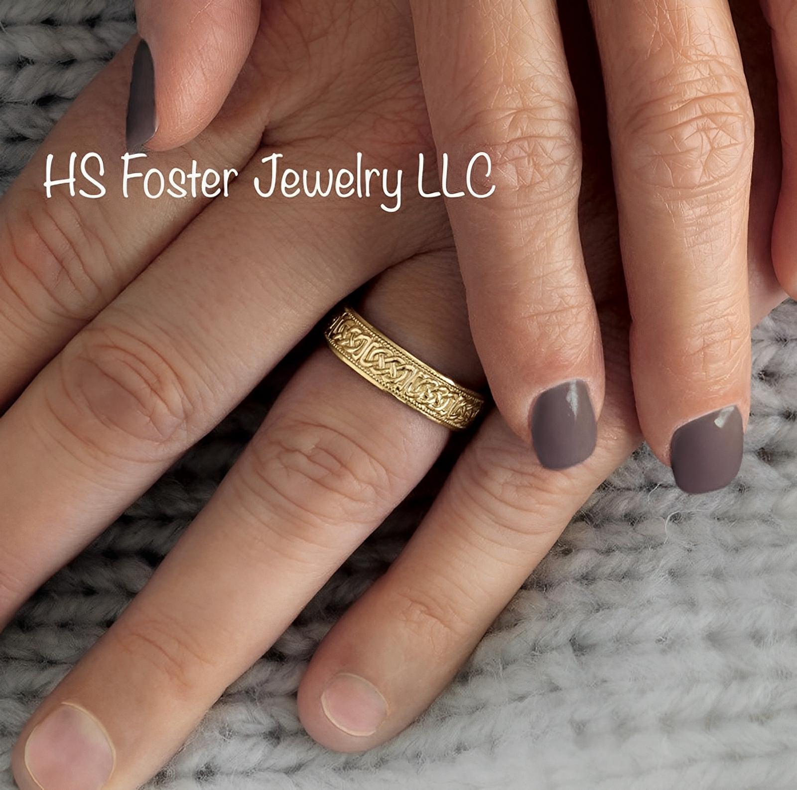 Yellow gold Celtic inspired band.