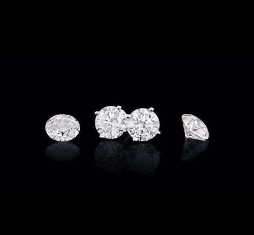 14kt white gold Lab grown diamond earrings. qg