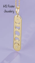 Load image into Gallery viewer, Yellow gold moon phase diamond pendant.