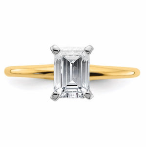 Moissanite in yellow gold Emerald cut. NICE!