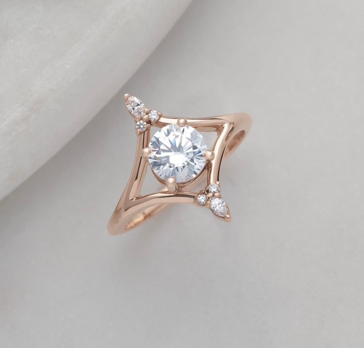 Rose gold ring featuring Lab grown diamonds.