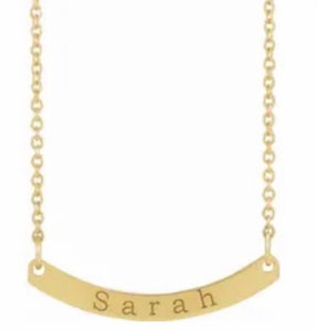 Engraved curved bar necklace. 14kt yellow gold