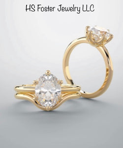 Yellow gold natural oval diamond ring.