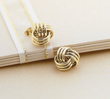 Load image into Gallery viewer, Earrings, knot fashion in yellow gold