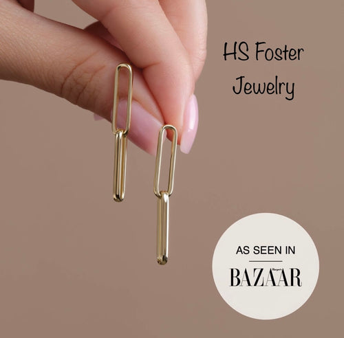 Yellow gold flat oval link earrings.