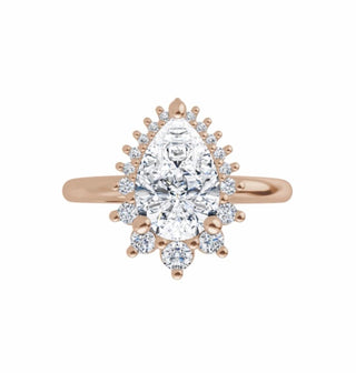 Bridal set, yellow gold and natural diamonds featuring pear-shaped diamond