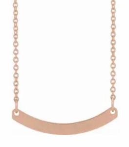 Engraved curved bar necklace. 14kt yellow gold