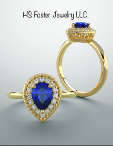 14kt yellow gold natural blue sapphire and diamond ring.
