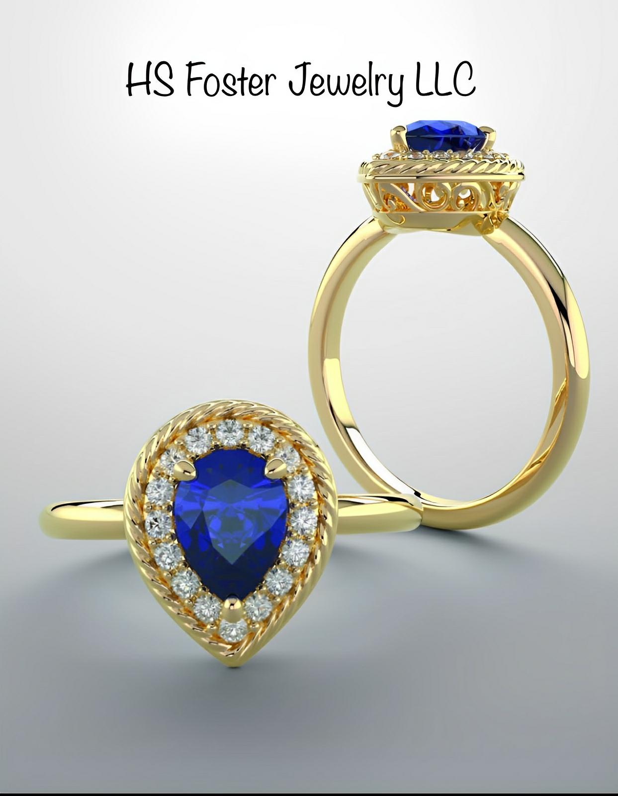 14kt yellow gold natural blue sapphire and diamond ring.