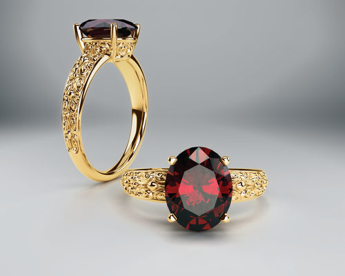 Color gem ring yellow gold garnet color