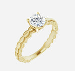 Rose gold engagement ring with natural diamond.